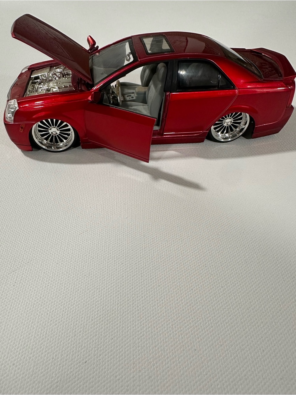Jada Toys DUB City 2002 Cadillac CTS 1:24 - Candy Red